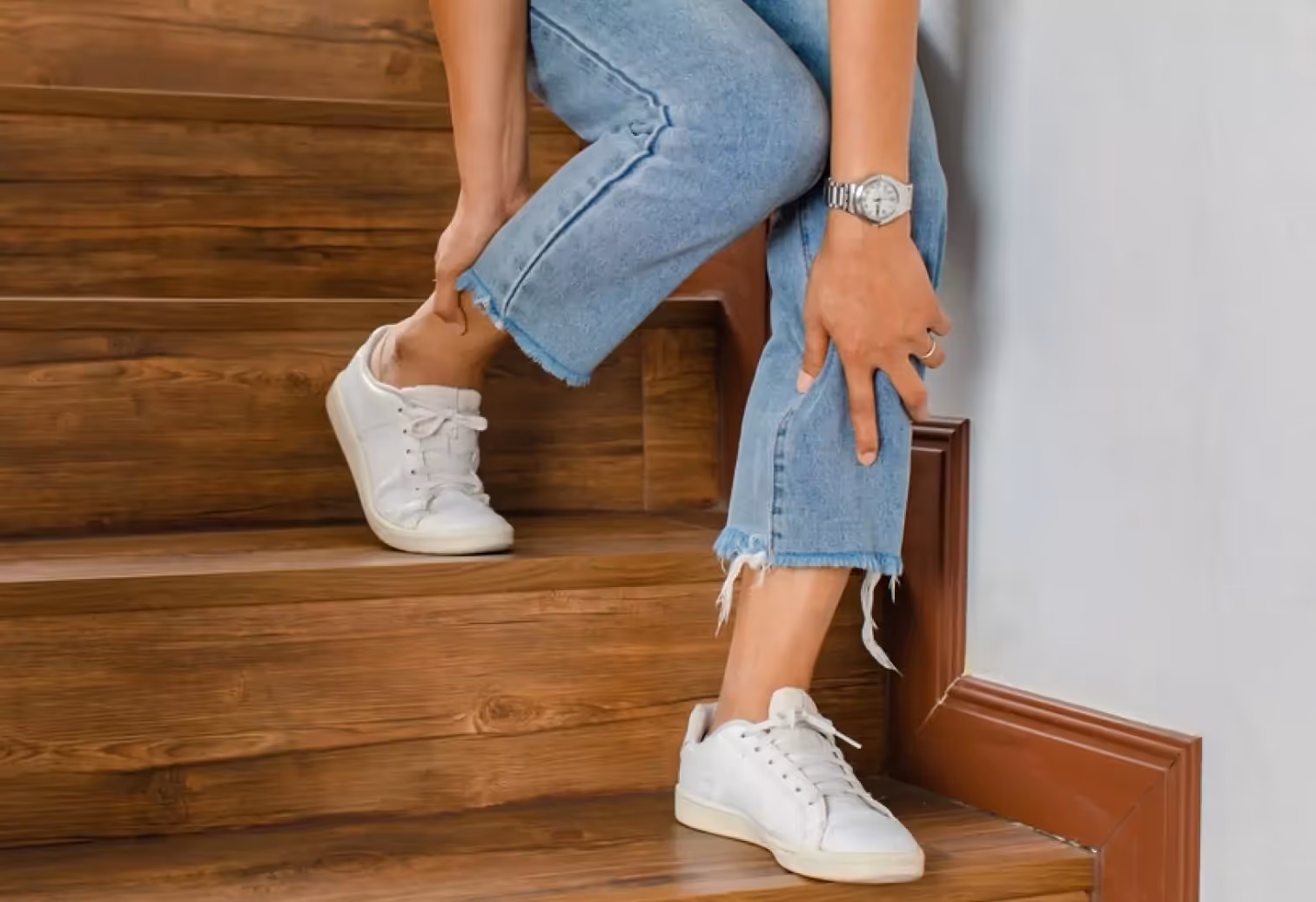 someone with ankle pain