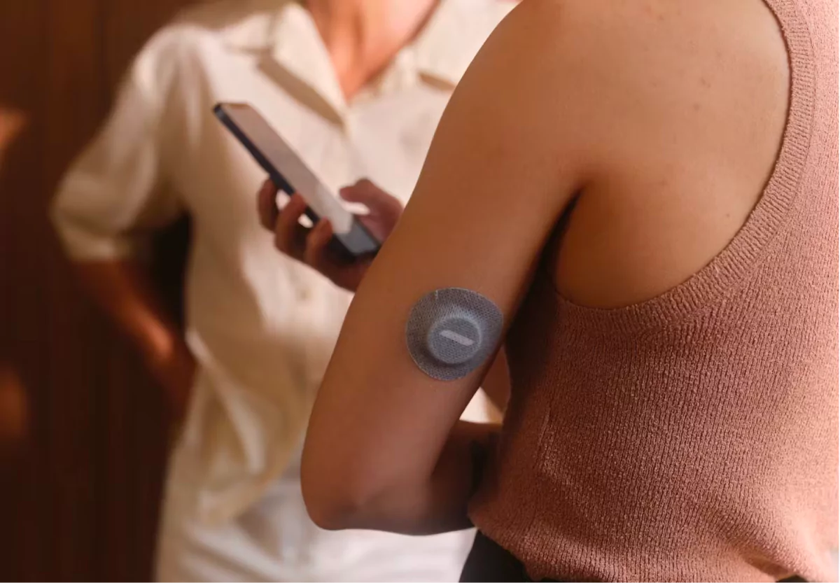 a woman wearing the Veri CGM
