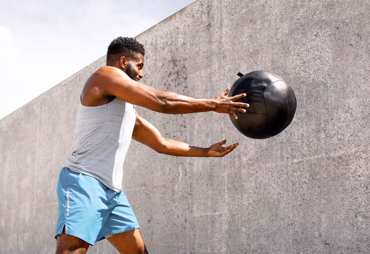 someone doing throwing a ball exercises