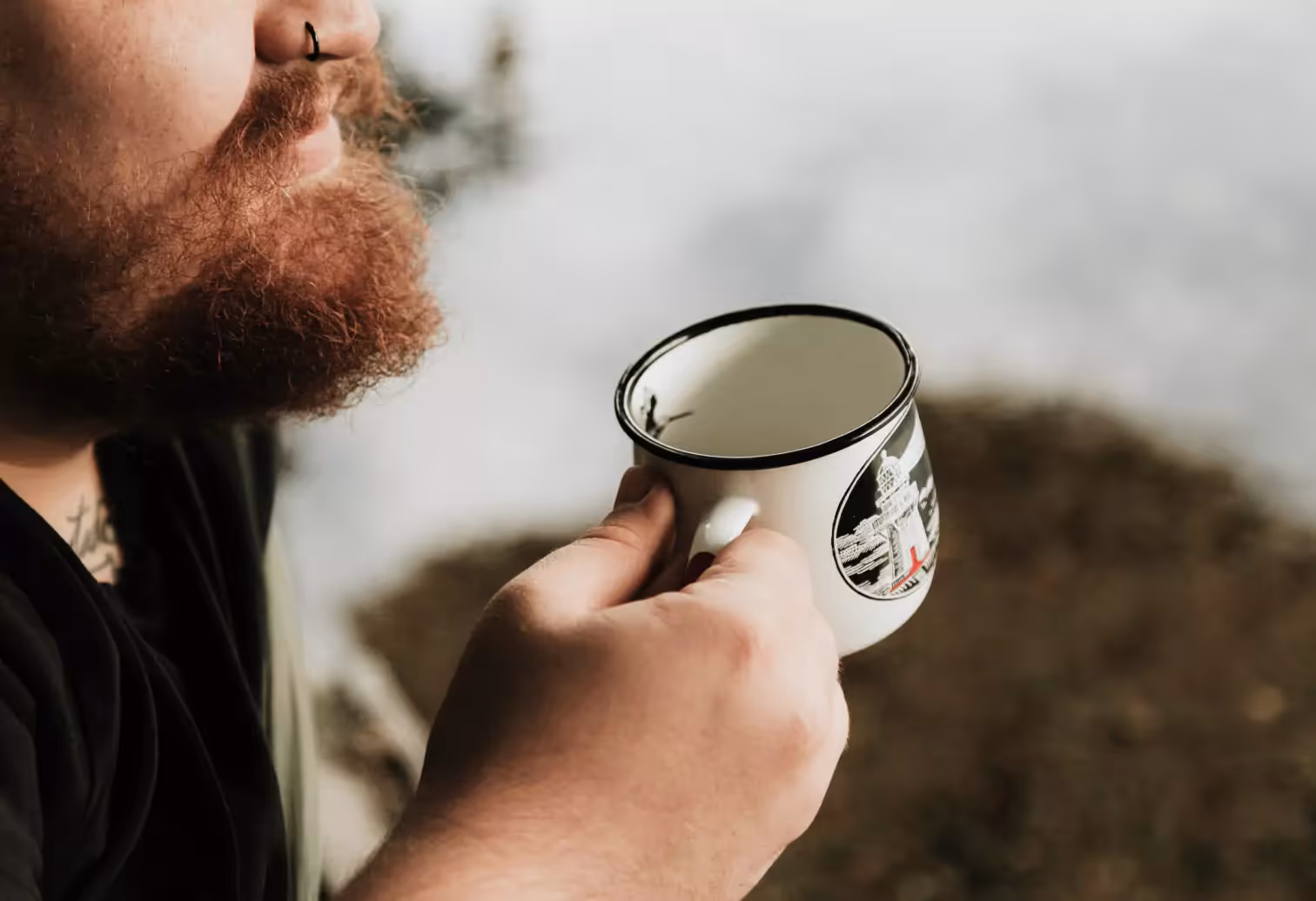 a person holding a cup