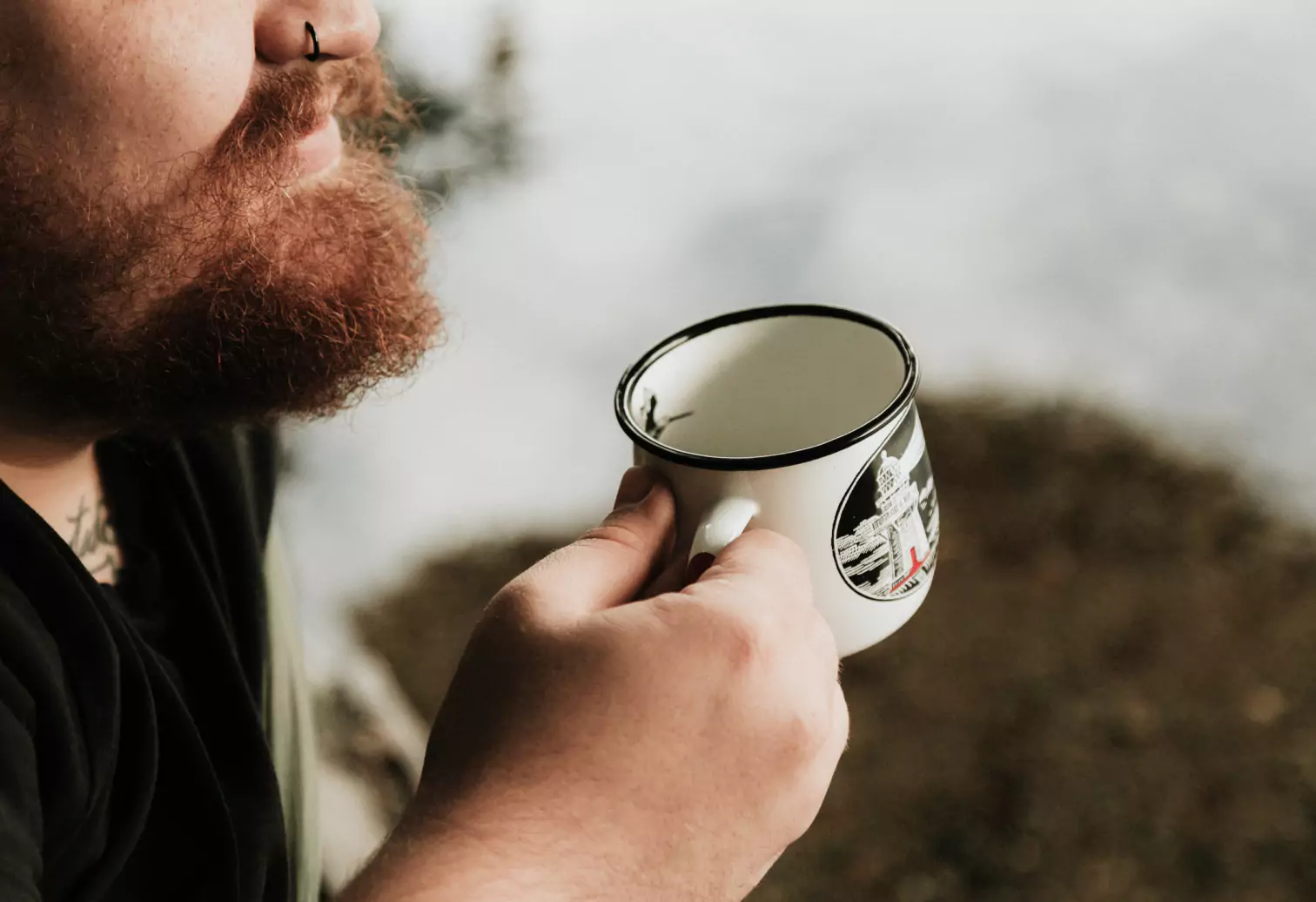a person holding a cup