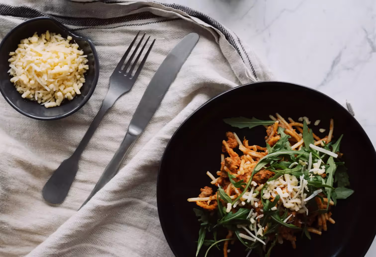 a plate of meat and veggies 