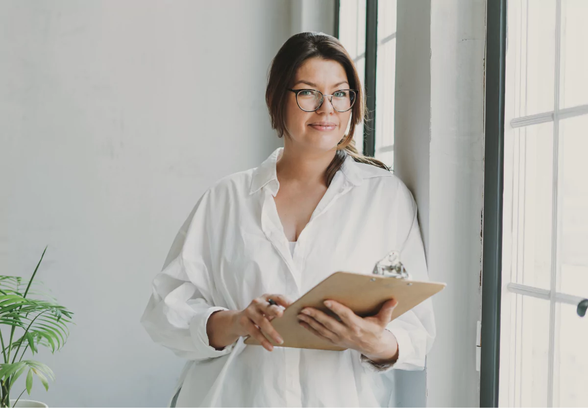 a nutritionist holding a clipboard