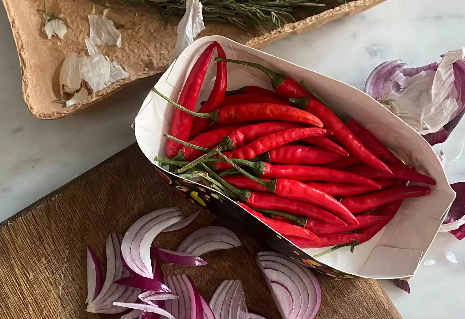 a carton of red chili