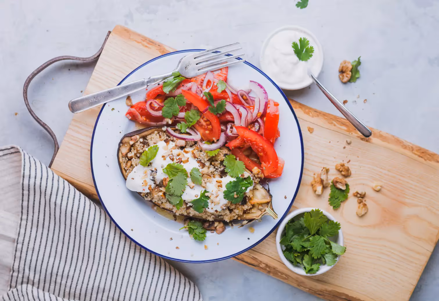 a plate of eggplant and tomatoes