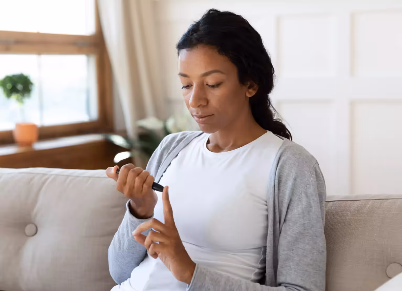 a person checking their blood sugar