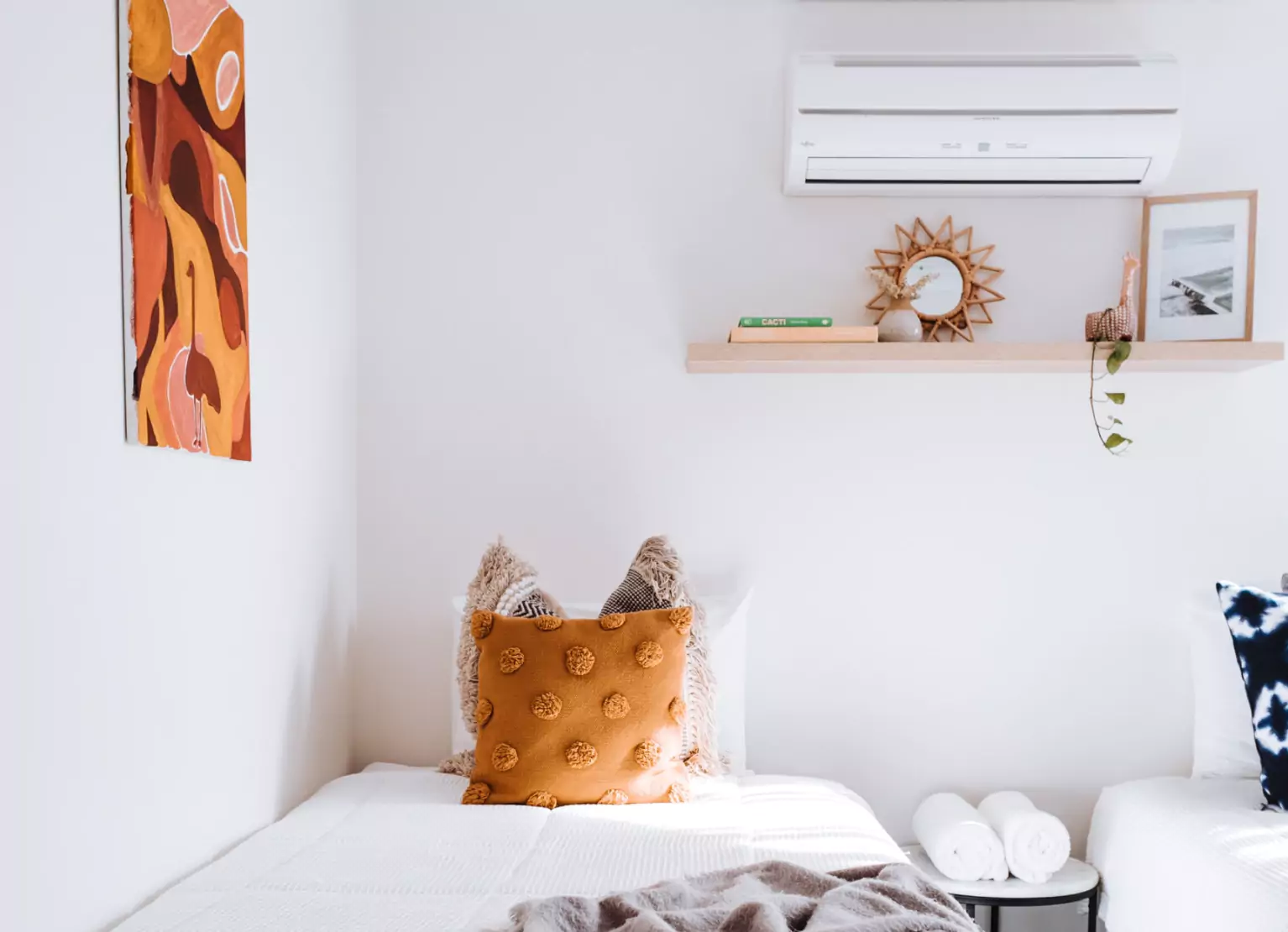 Bright minimalistic bedroom with air filter