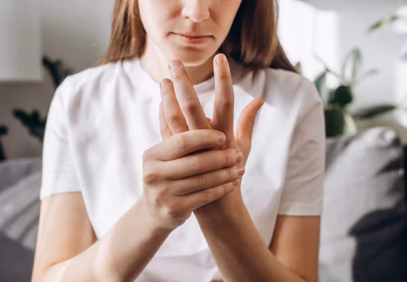 a girl feeling her fingers