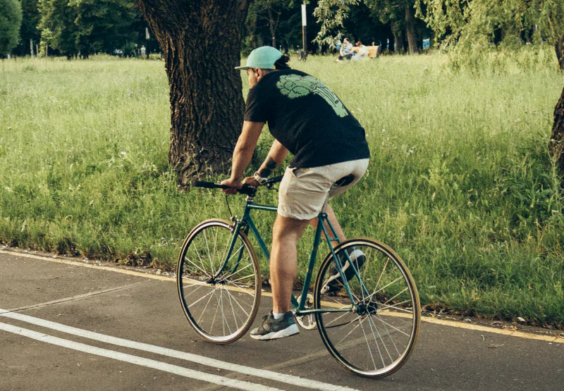 a man riding a bike outside