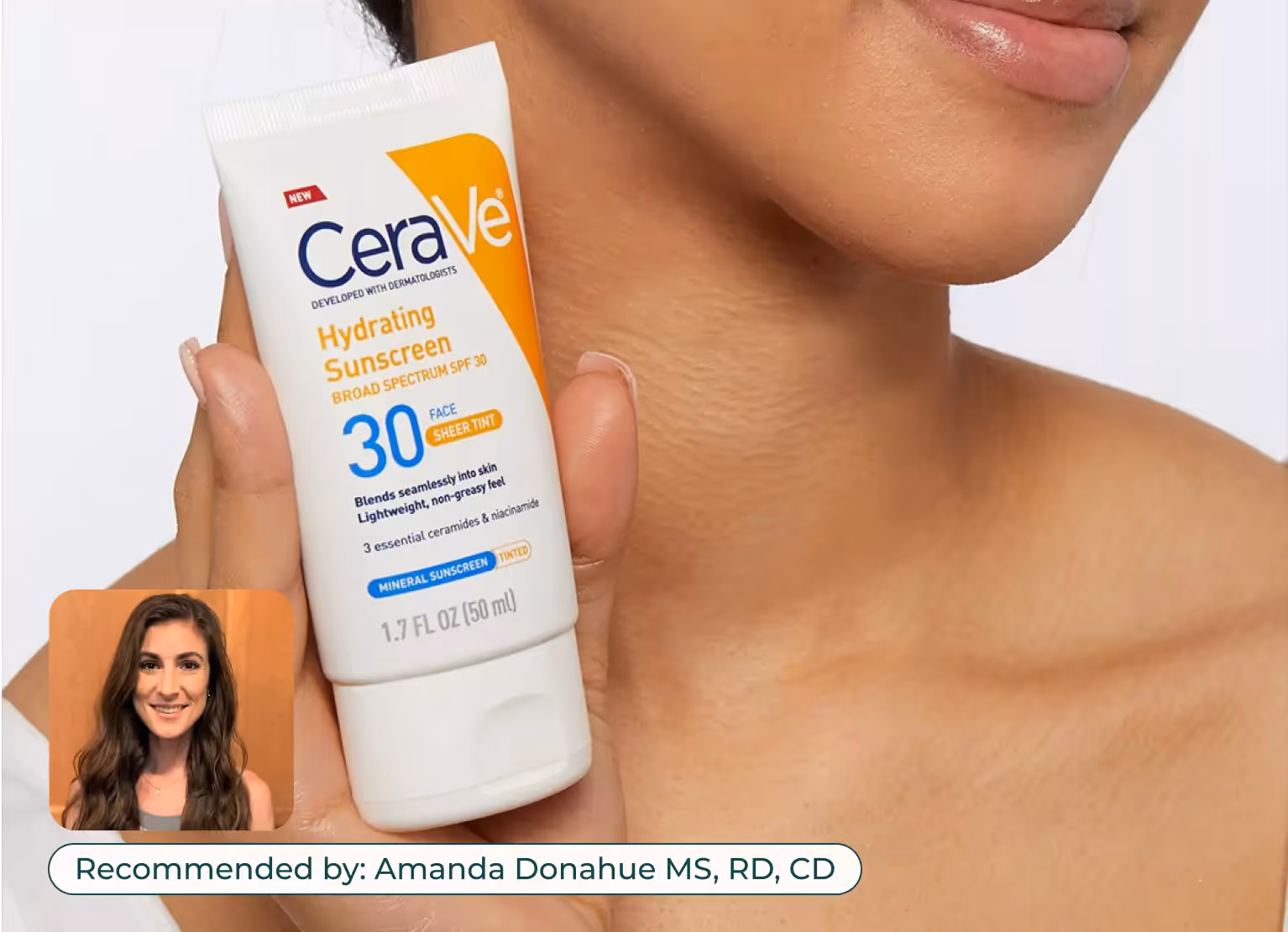 A person holding CeraVe sunscreen