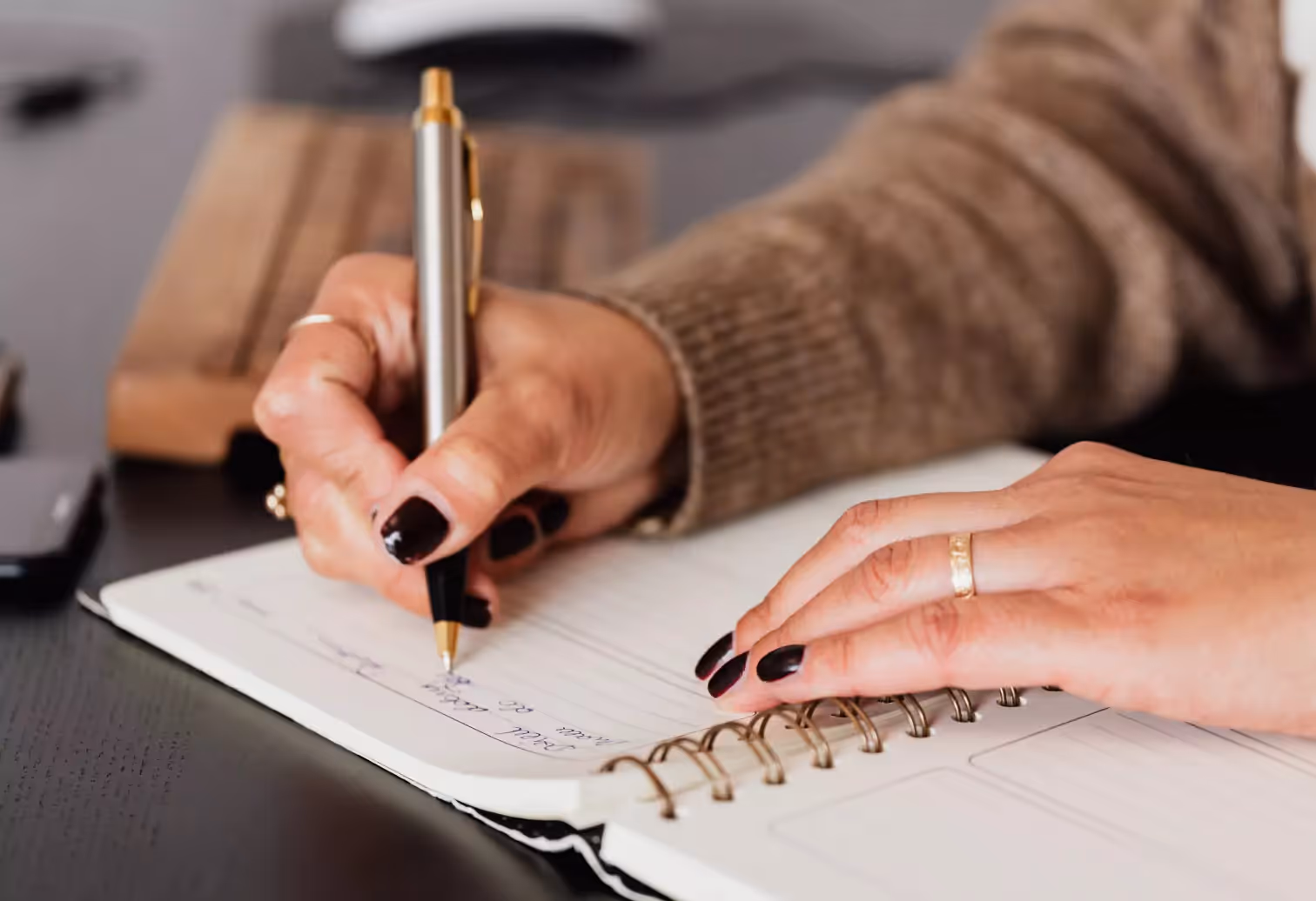 writing in a notebook