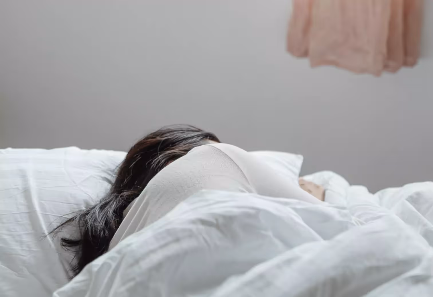 a person sleeping in the bed