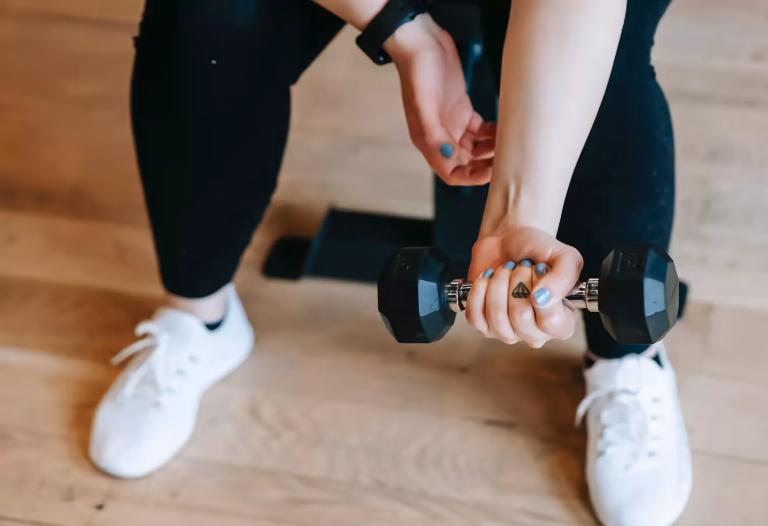 holding a dumbbell
