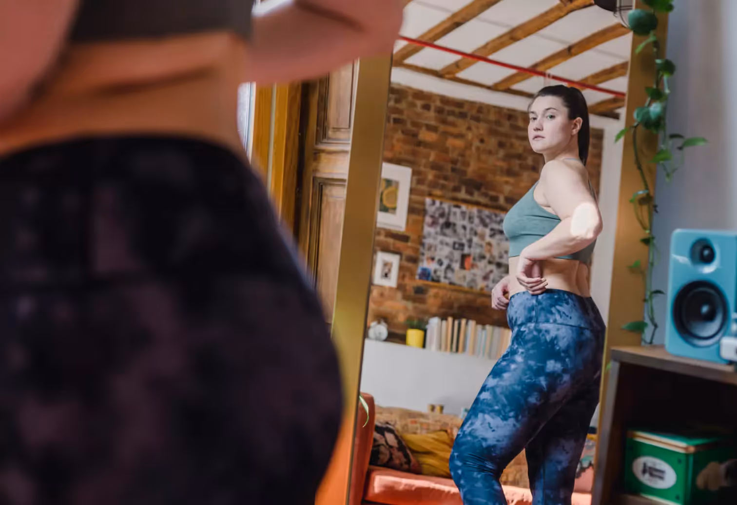 a girl looking in the mirror