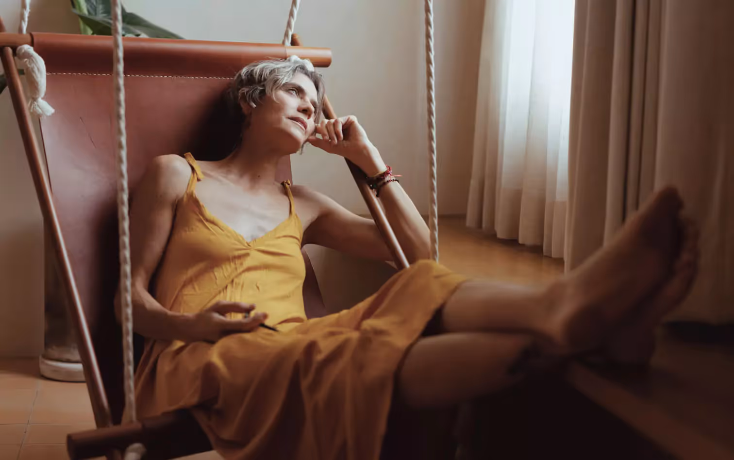 a person sitting in a armchair