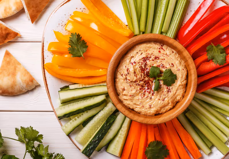a plate of veggies and baba ganoush