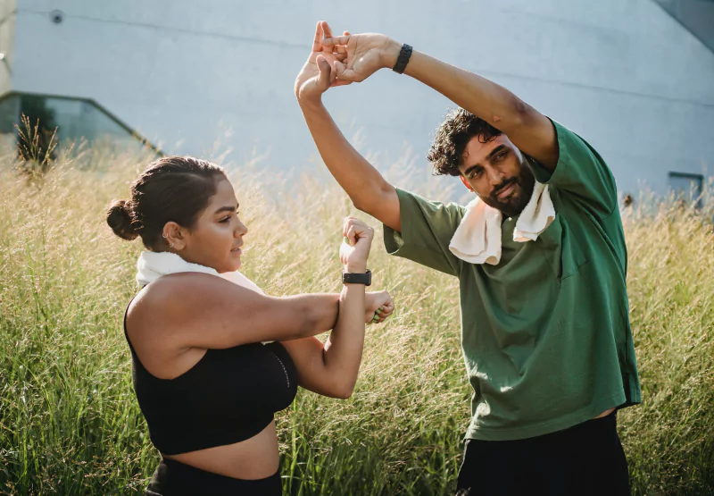 Man and woman warming up