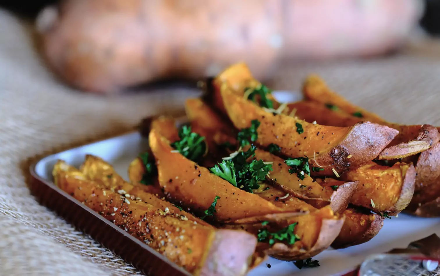 a baked yam with parsley