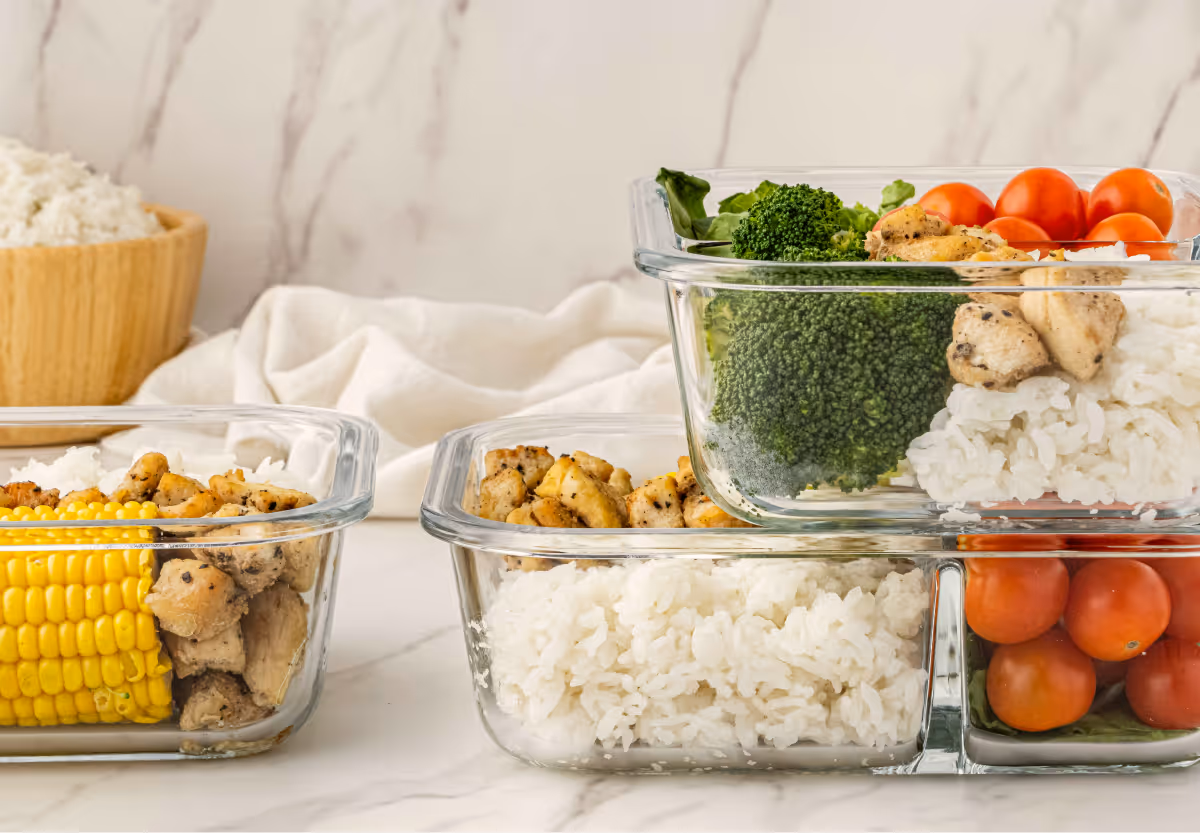 Fresh produce and food in glass storage containers