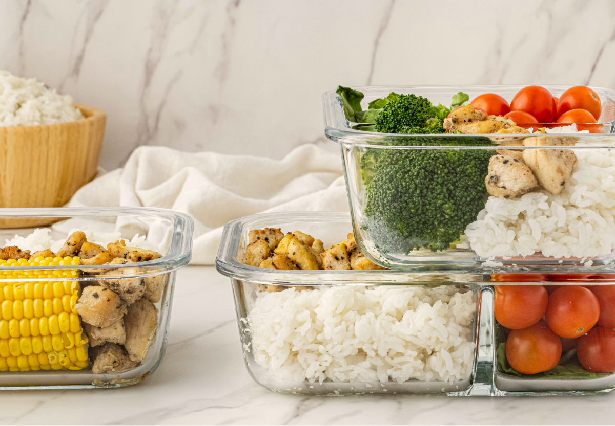 Fresh produce and food in glass storage containers