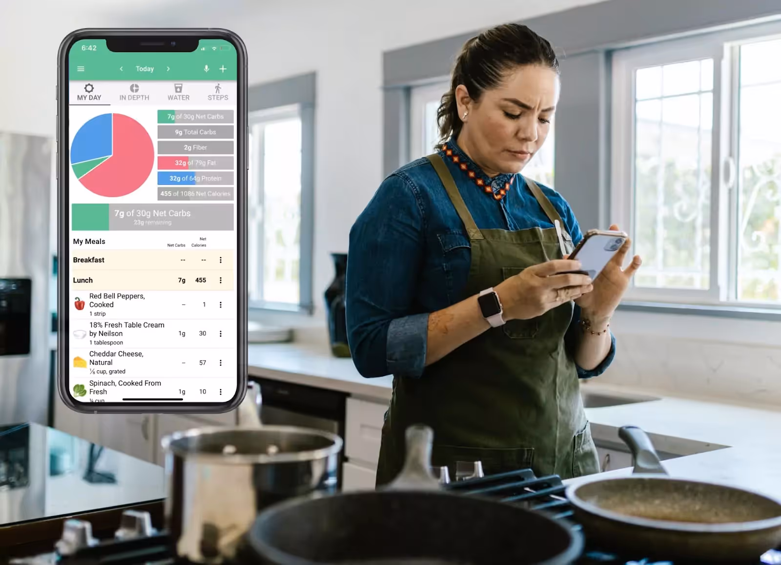 Carb Manager app and a erson looking at their phone