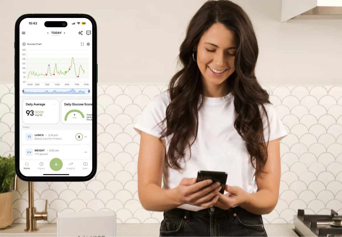a woman using the nutrisense app
