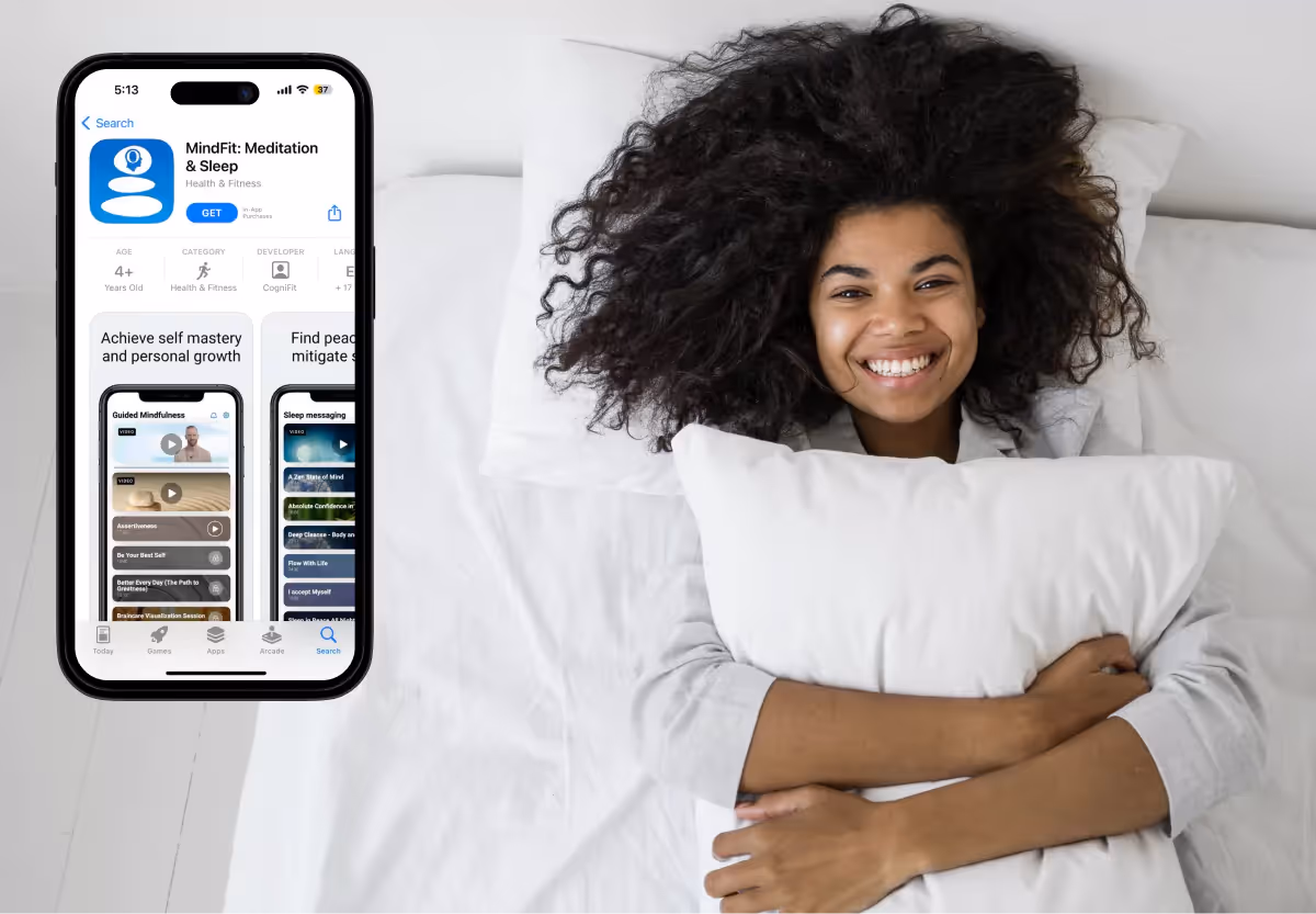 a girl smiling in bed and the mindfit app
