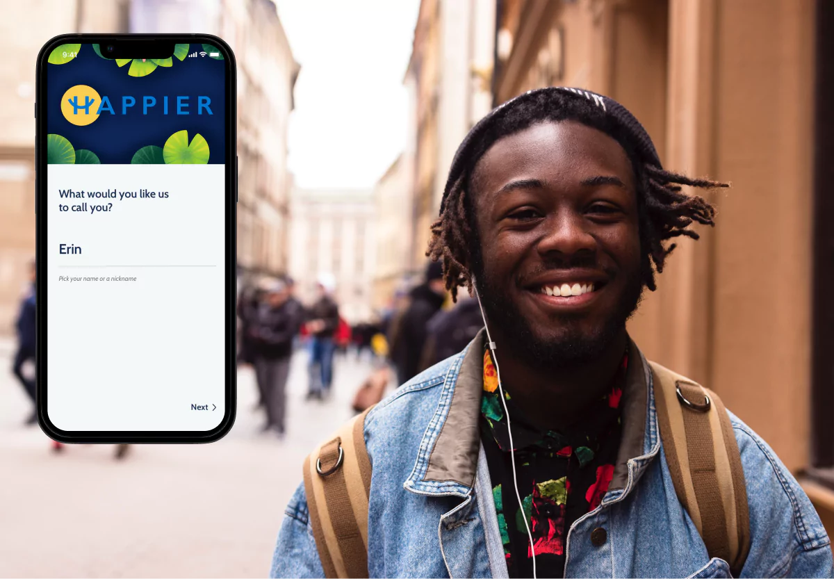 someone smiling in the street and the happier app