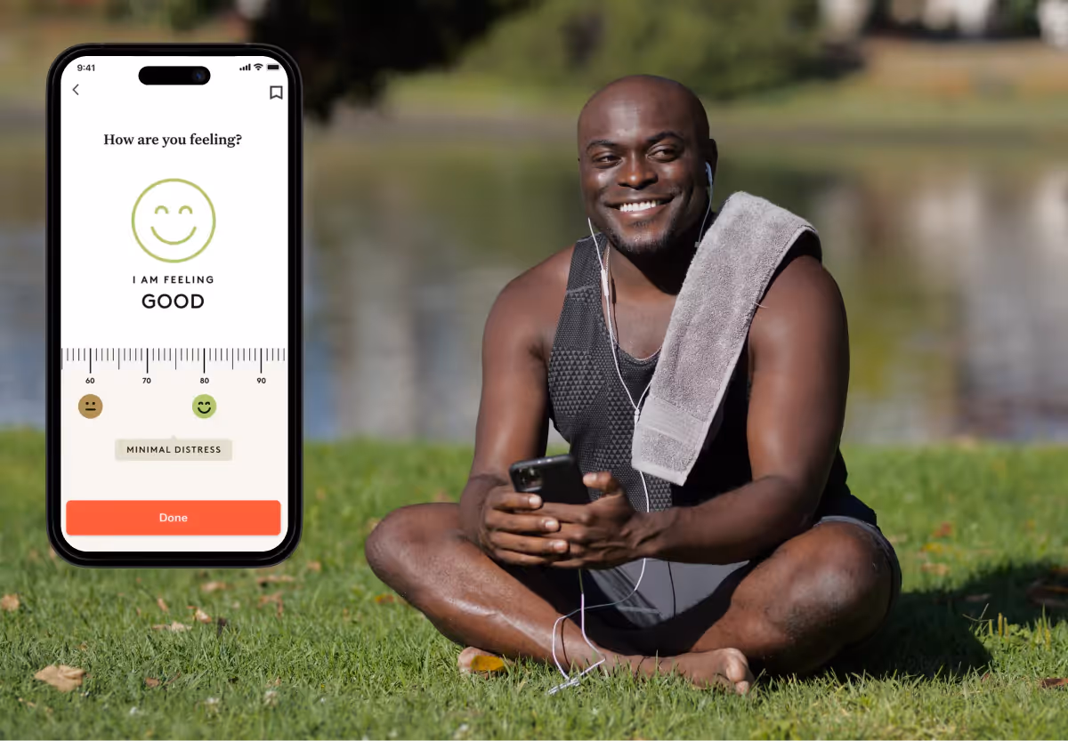 a man with headphones and the noom app