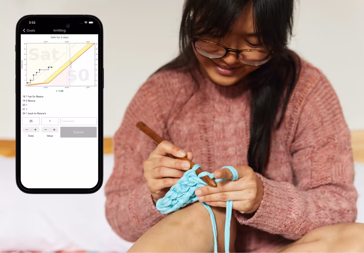 a girl using the beeminder app