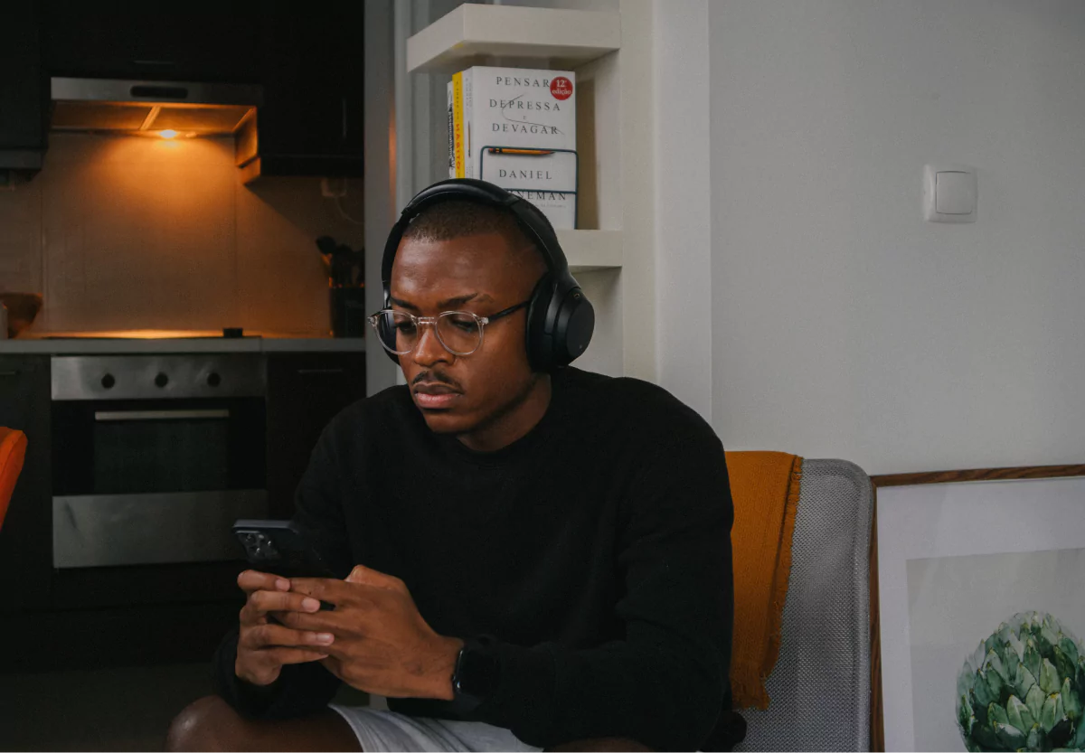 a man listening to a podcast with headphones