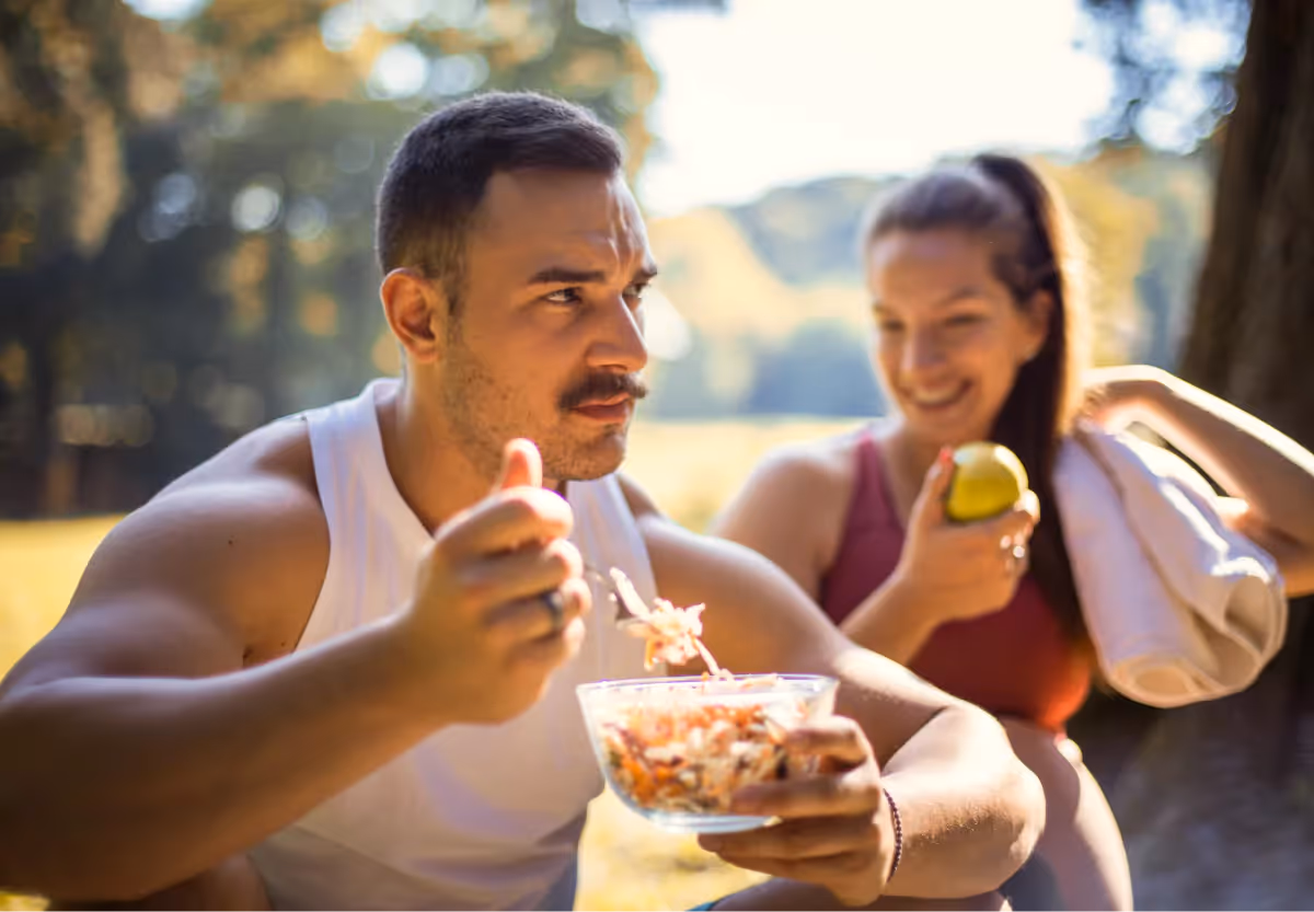 an athlete eating a healthy meal