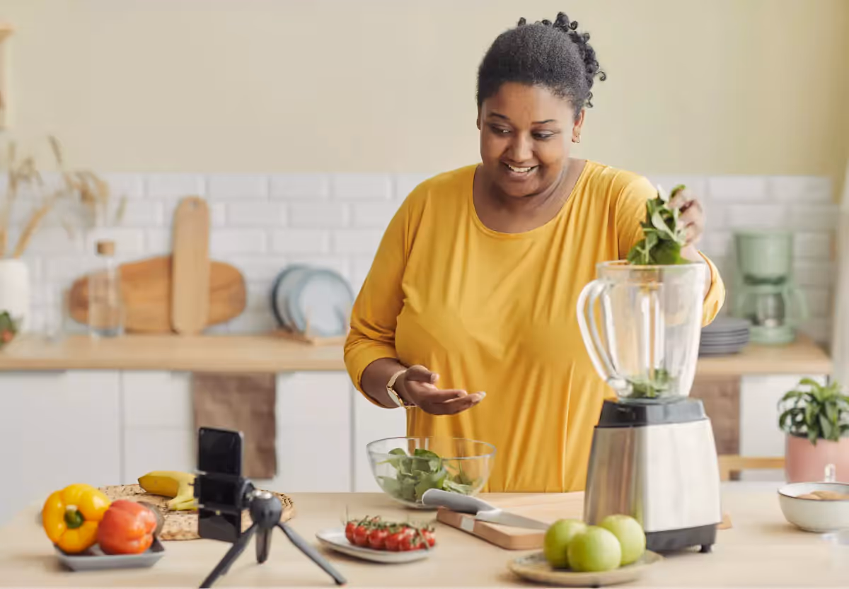 A person scanning a CGM sensor with a smartphone