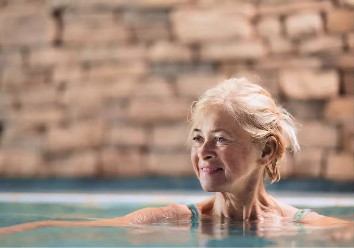a lady swimming in the pool