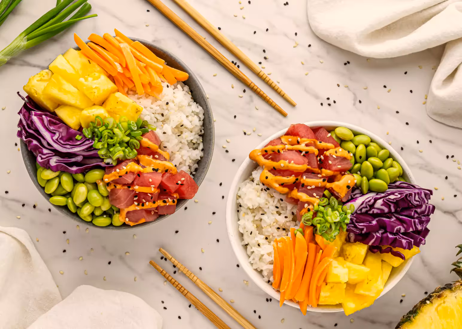 Two bowls of healthy food on a light background