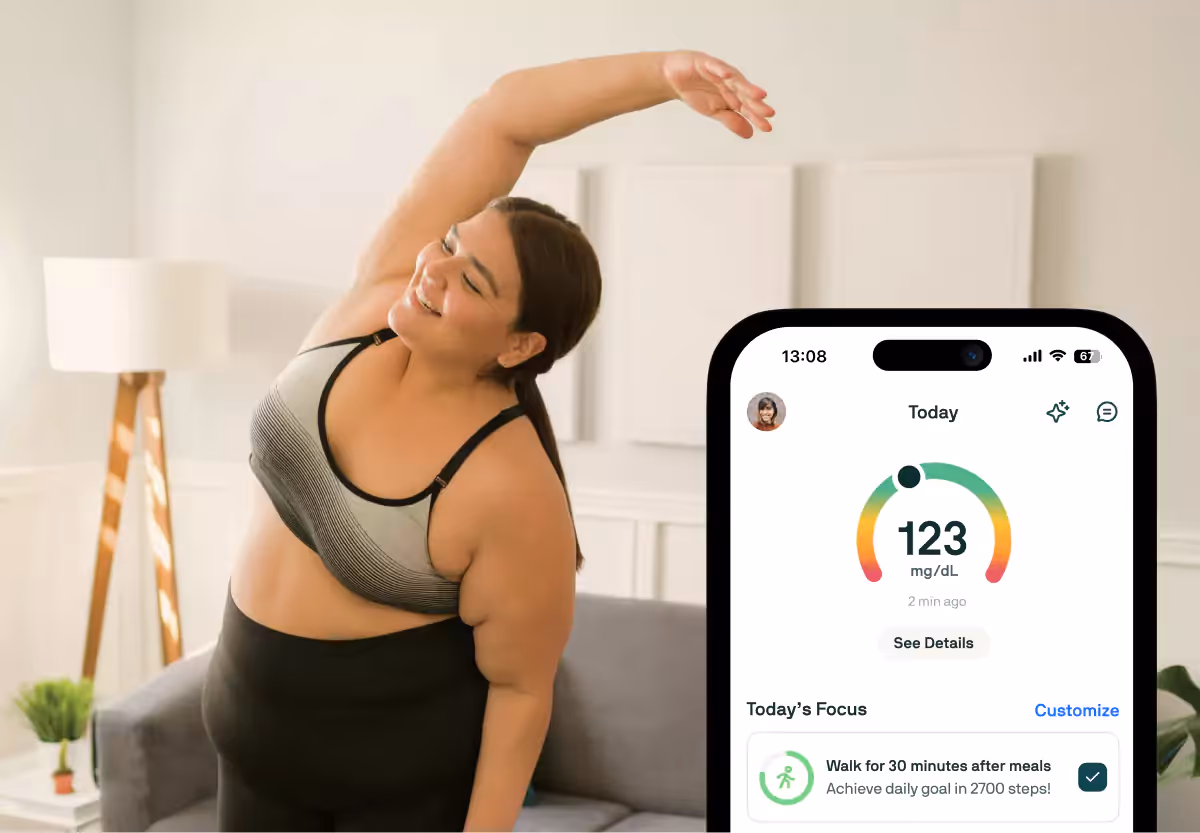 A person with long dark hair in workout clothes, stretching at home. Mobile screen of Nutrisense app overlaid