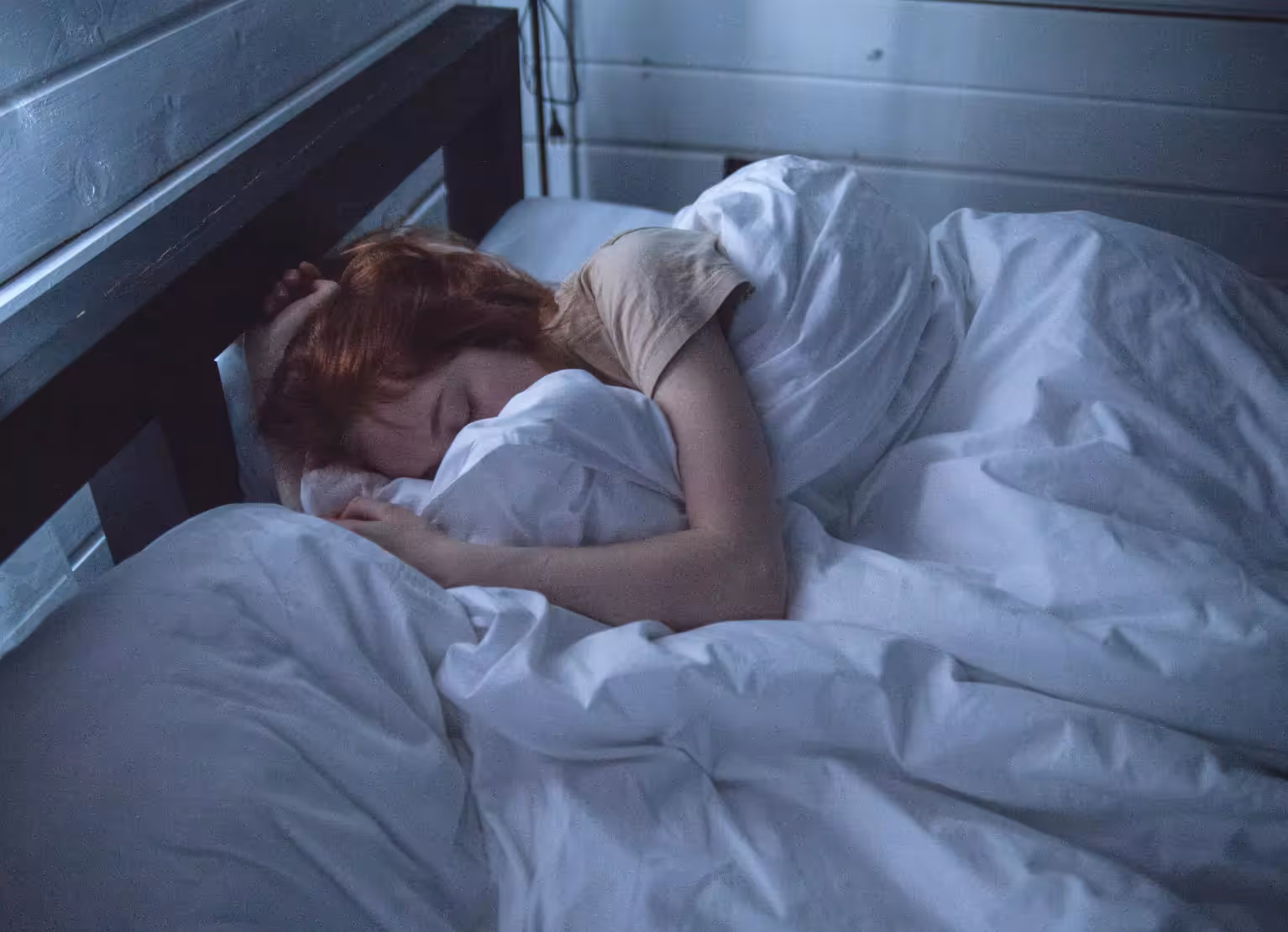 a person sleeping in bed