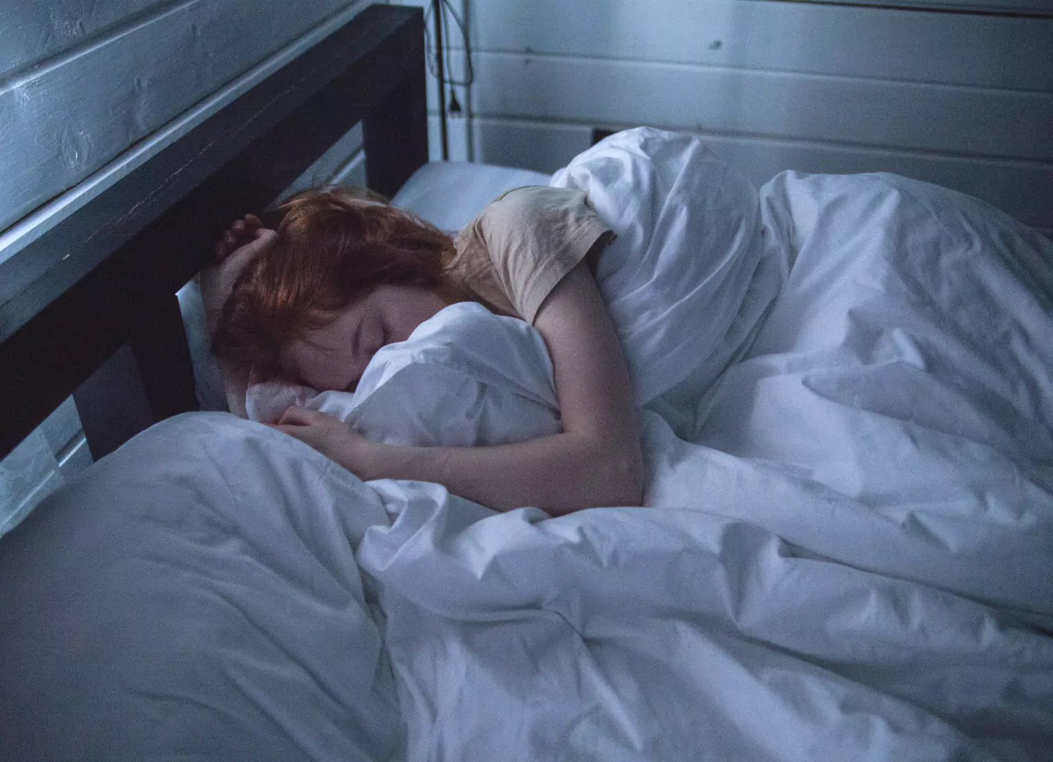 a person sleeping in bed