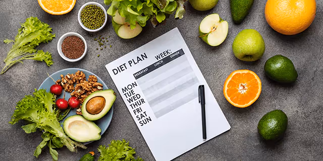 a diet plan and veggies, fruits and nuts