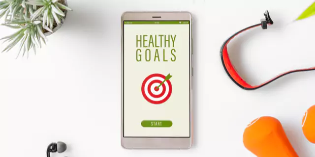 a phrase "Healthy goals" on a phone