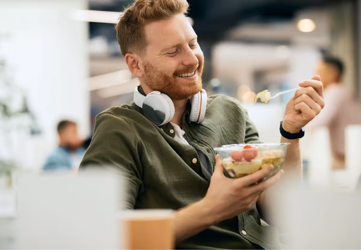 a man eating a salad