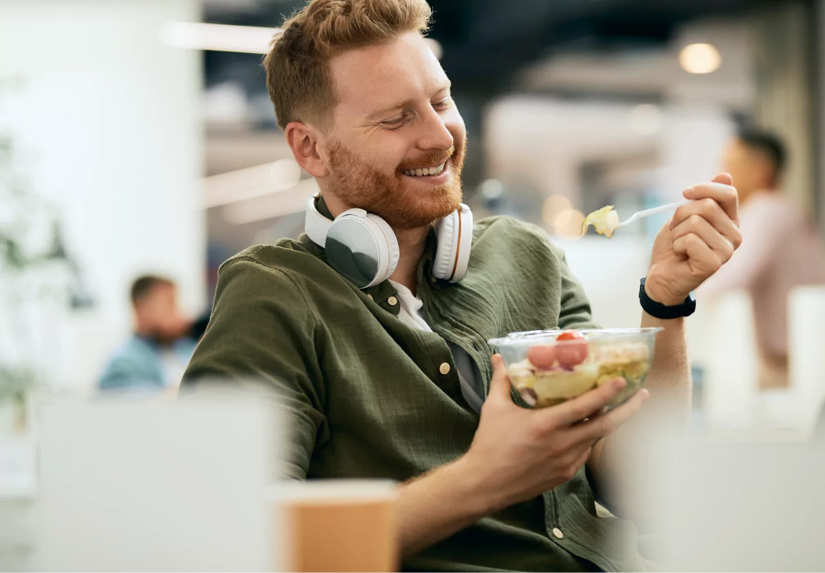 a man eating a salad