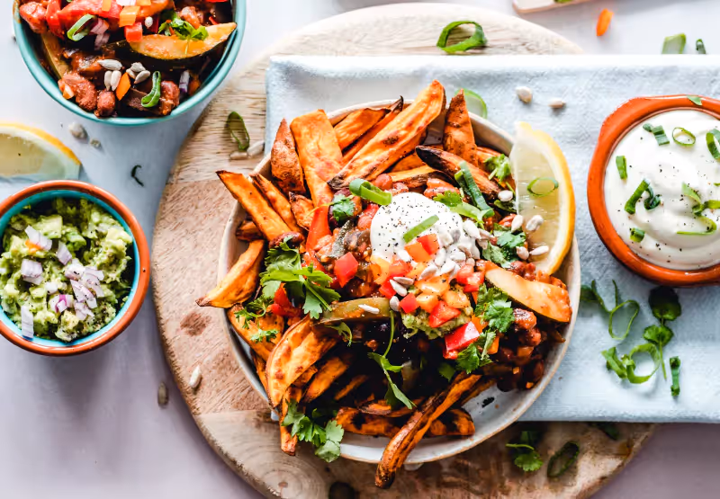 a plate of sweet potato fries and dip