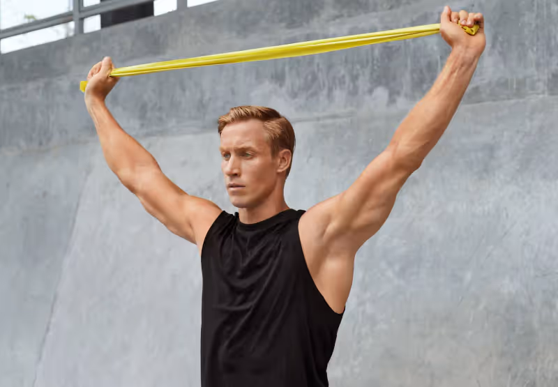 a man with a resistance band