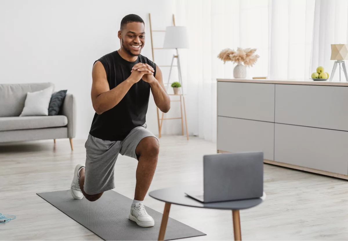 a man doing a lunge home workout