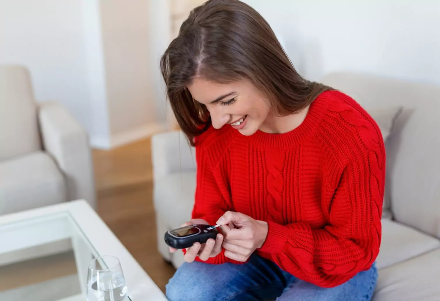 a person checking their glucose level 