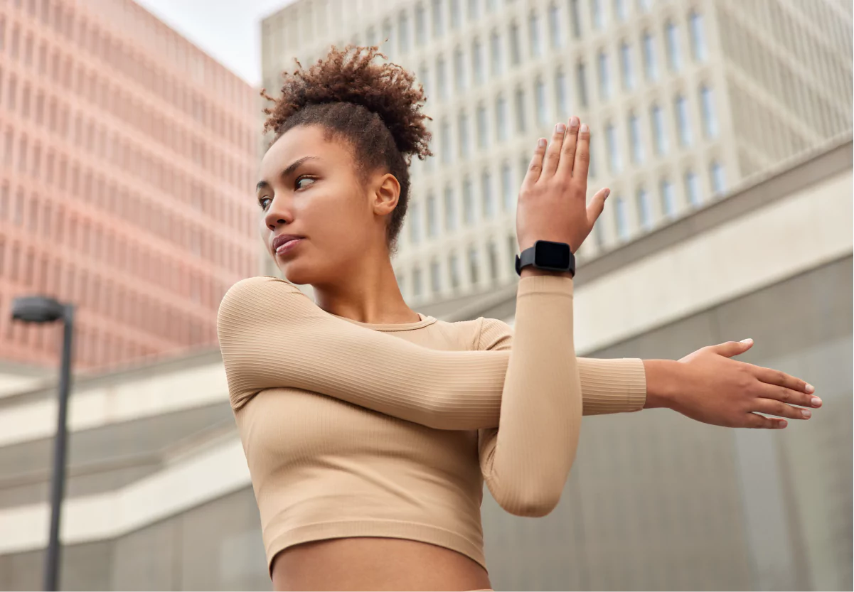 a girl doing warm up stretches