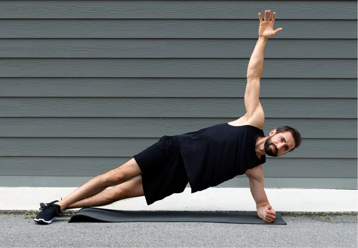 a man doing a side plank