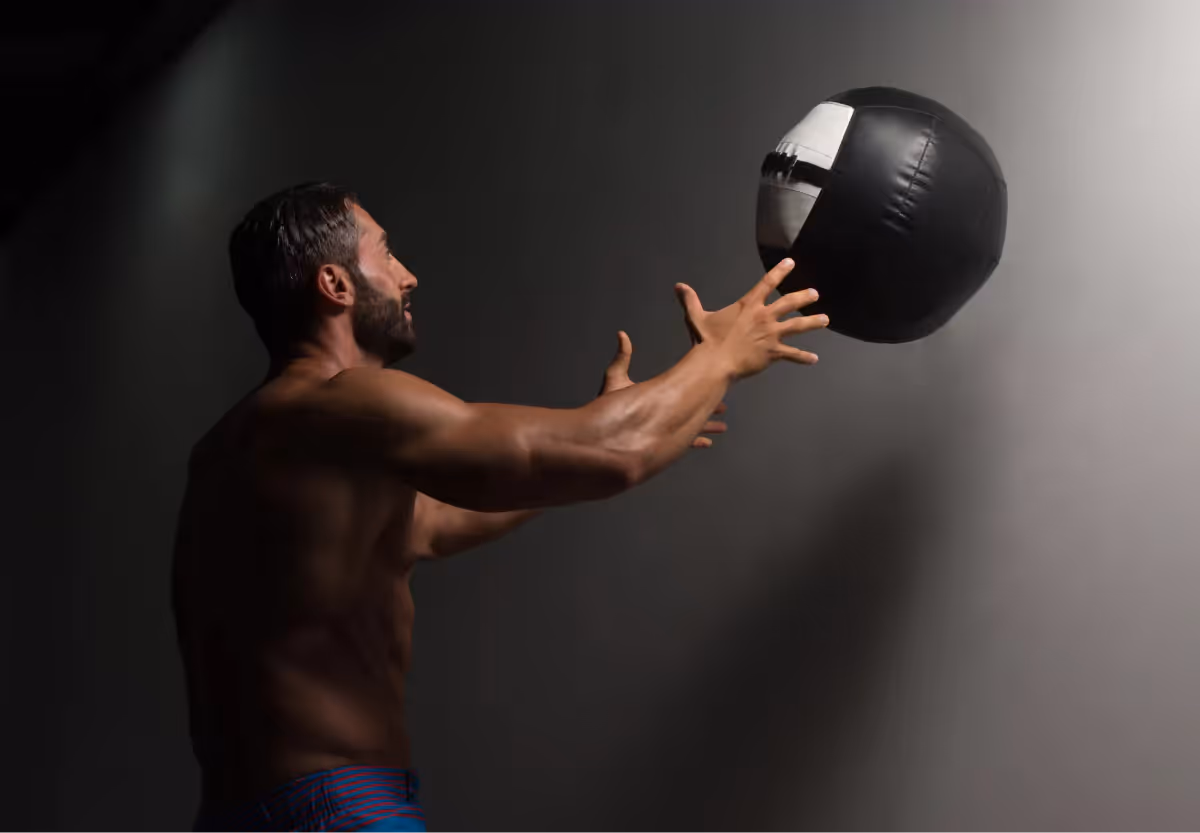 a man doing wall ball throws
