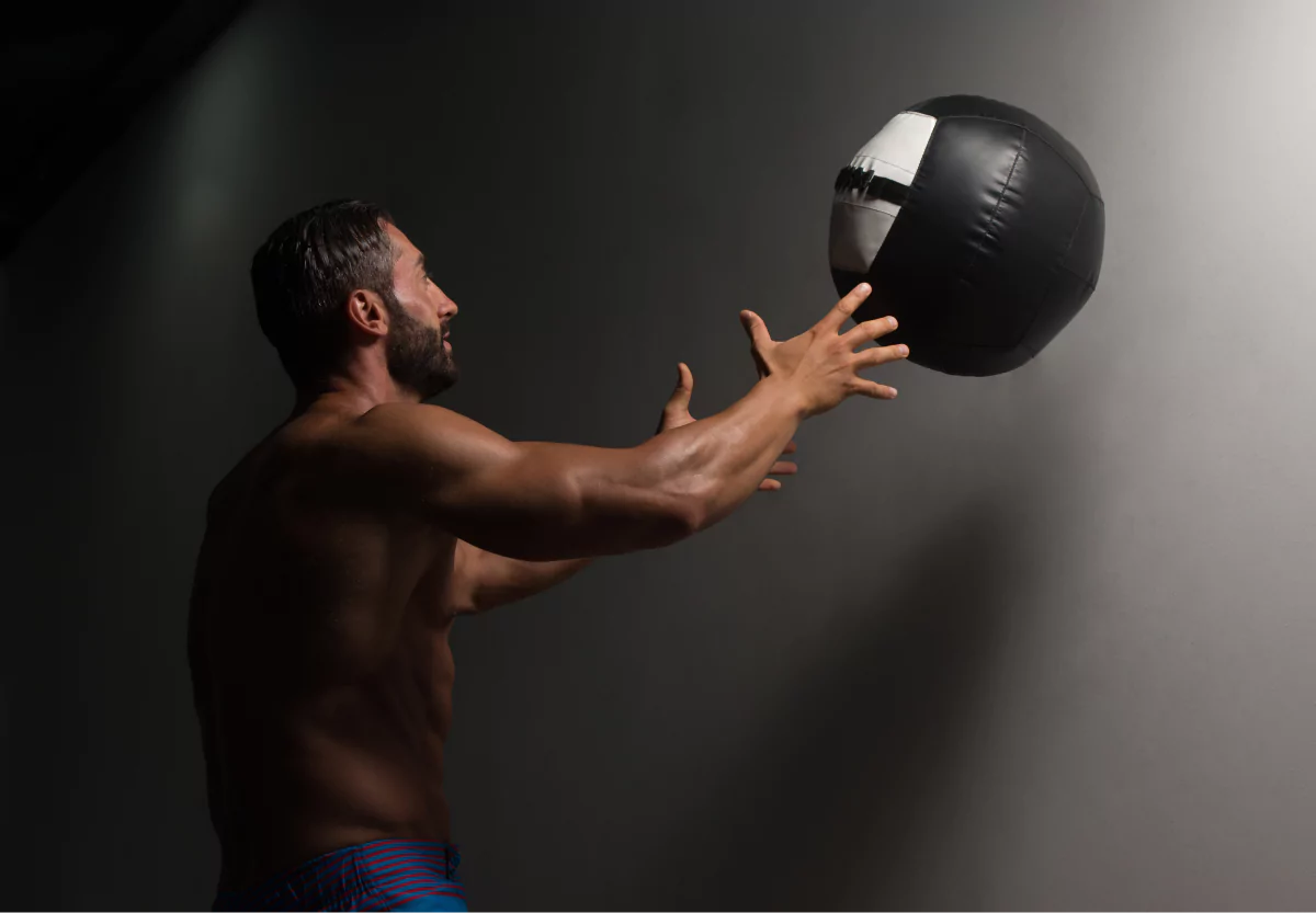 a man doing wall ball throws